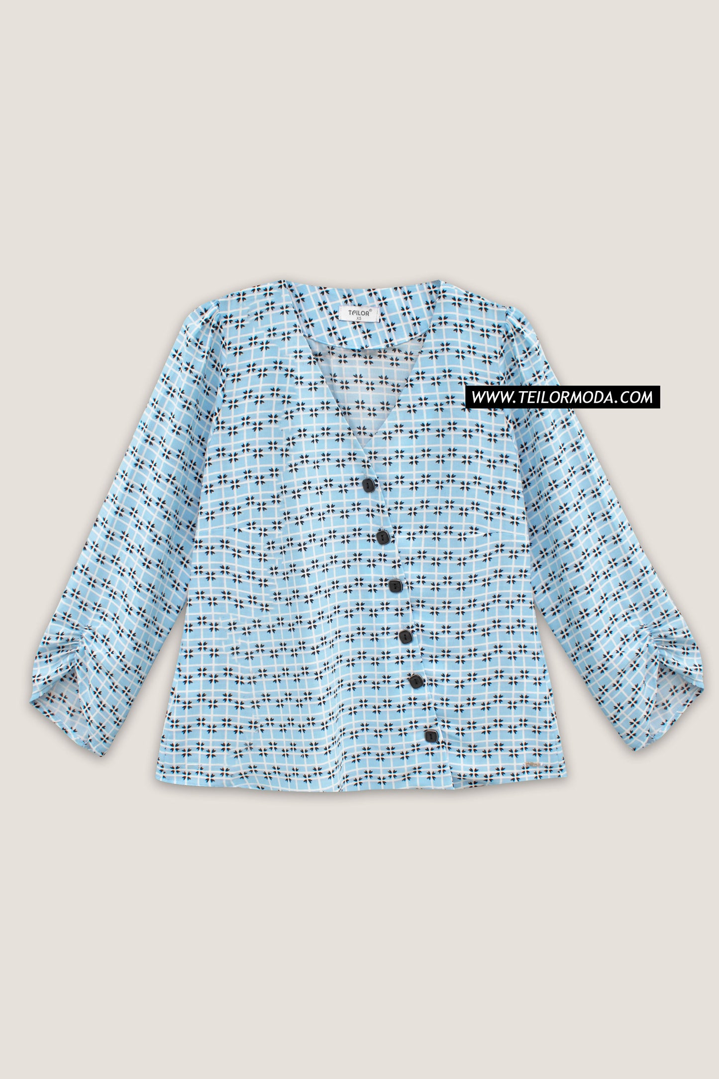 BLUSA ASIMÉTRICA ESTAMPADA ROUSE CELESTE