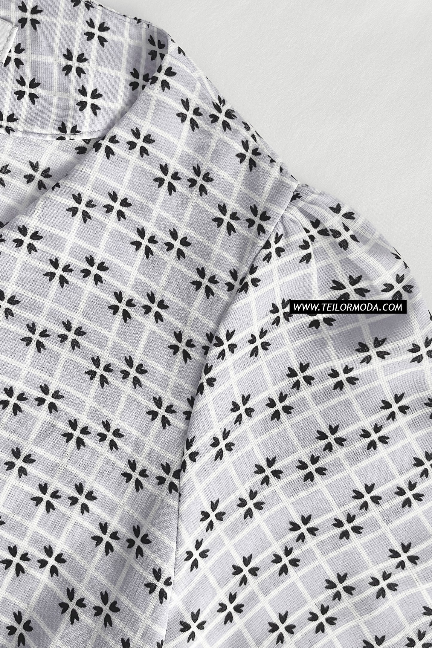 BLUSA ASIMÉTRICA ESTAMPADA ROUSE PLOMO
